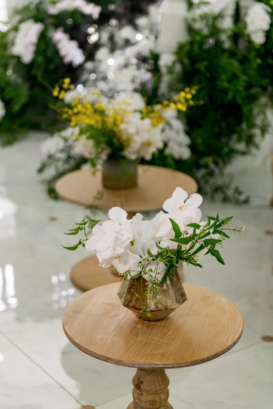 Statement floral arrangement in white, yellow and gold