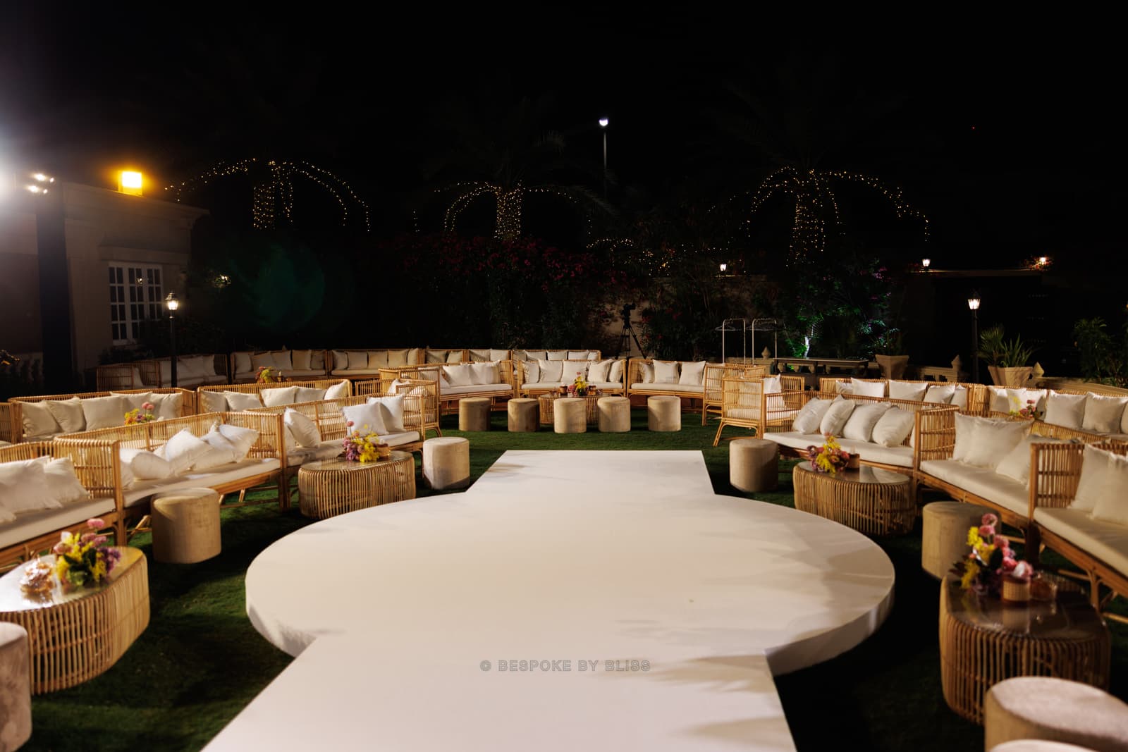 Full room view in white, rattan and gold