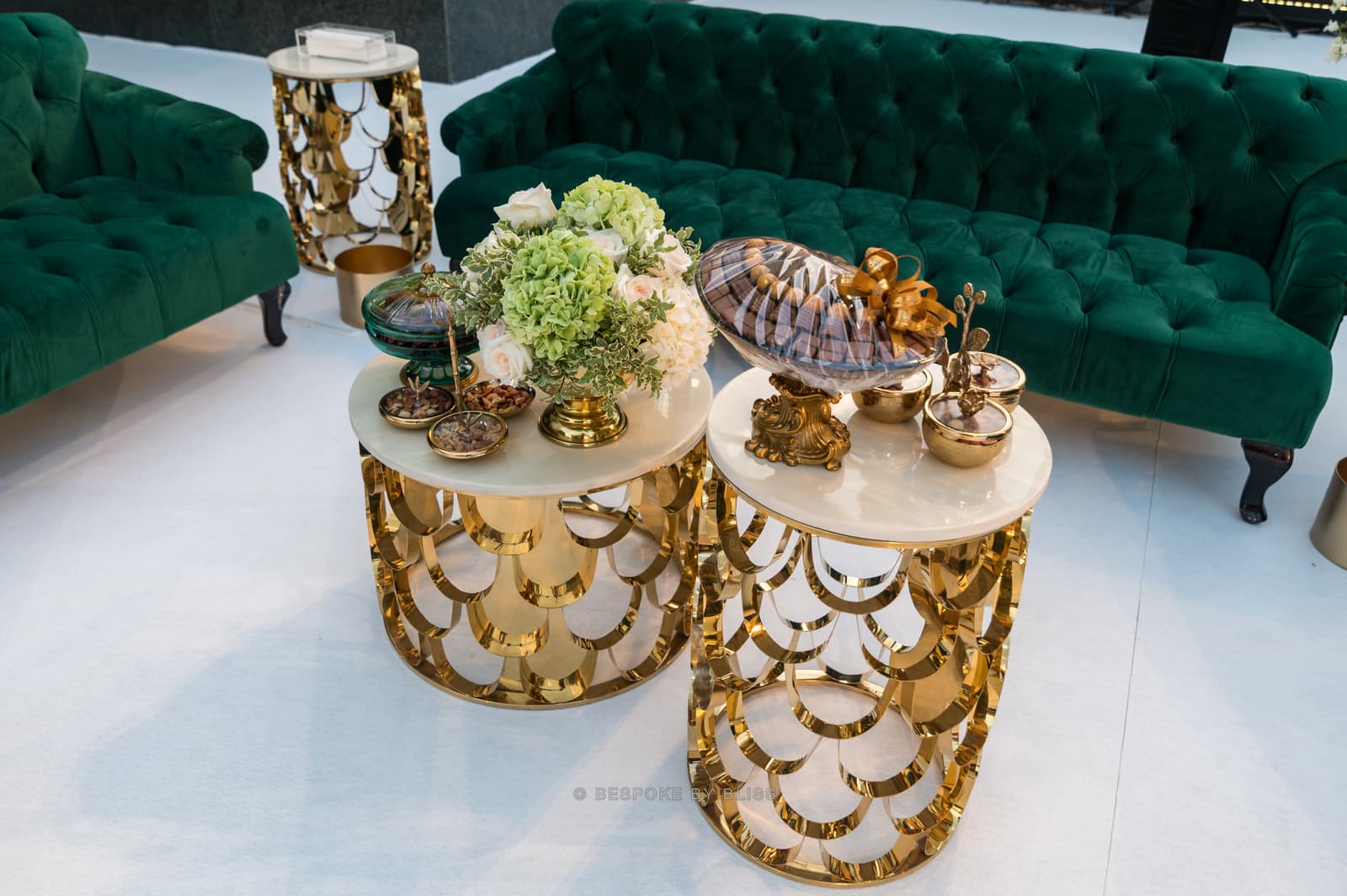 Lounge furniture styling in emerald, gold and white