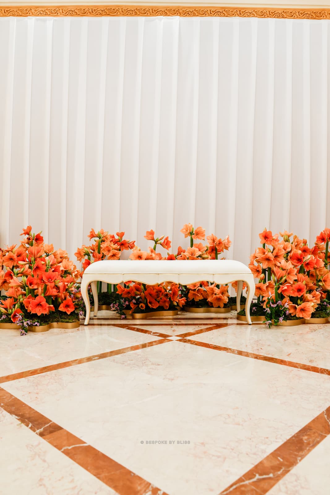 Stage styling in orange, ivory and cream
