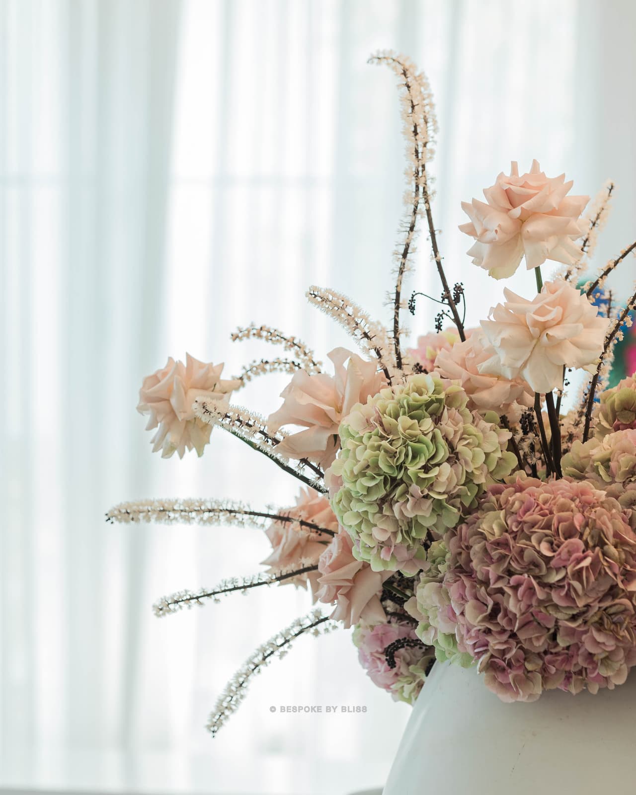 Statement floral arrangement in blush, sage and white