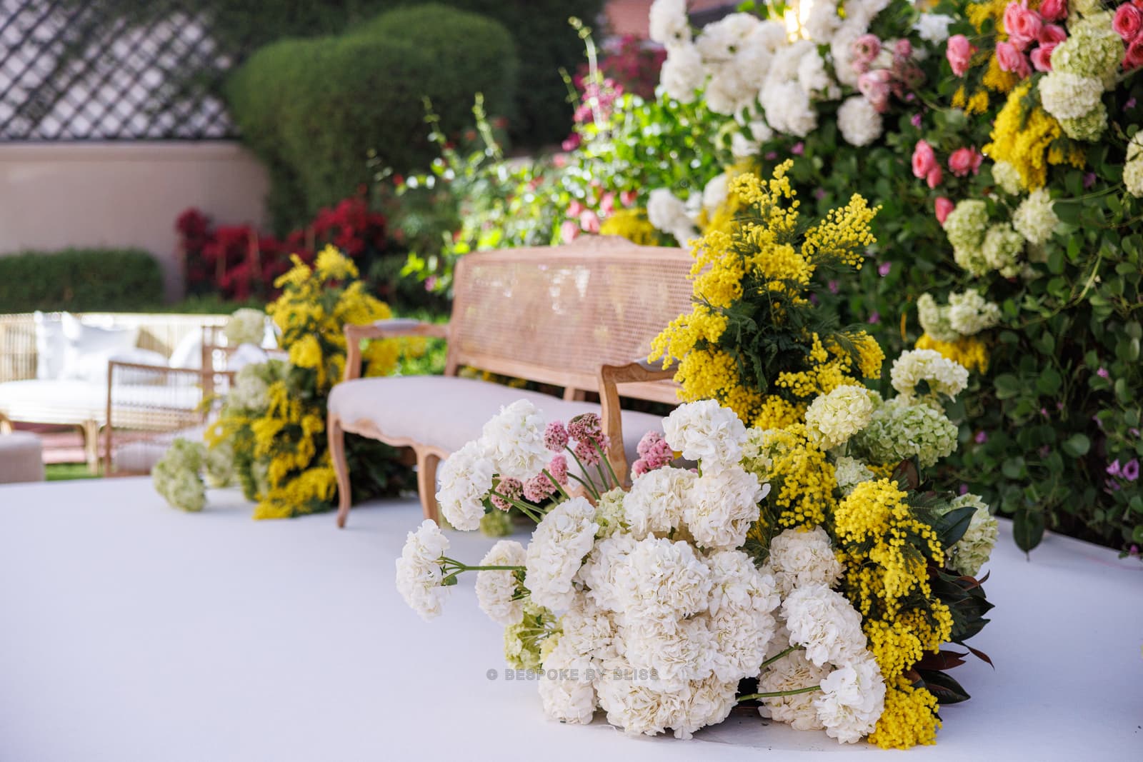 Floral wall or arch in white, yellow and pink