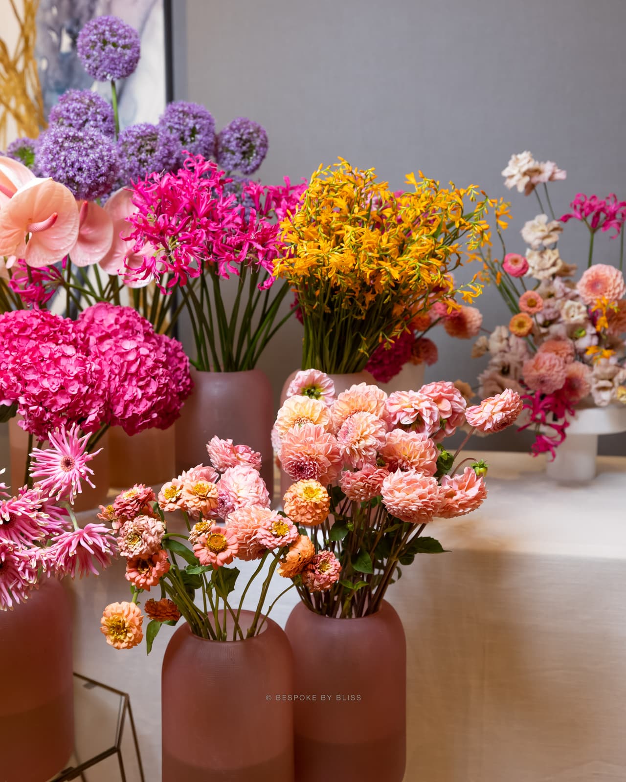 Statement floral arrangement in pink, purple and yellow