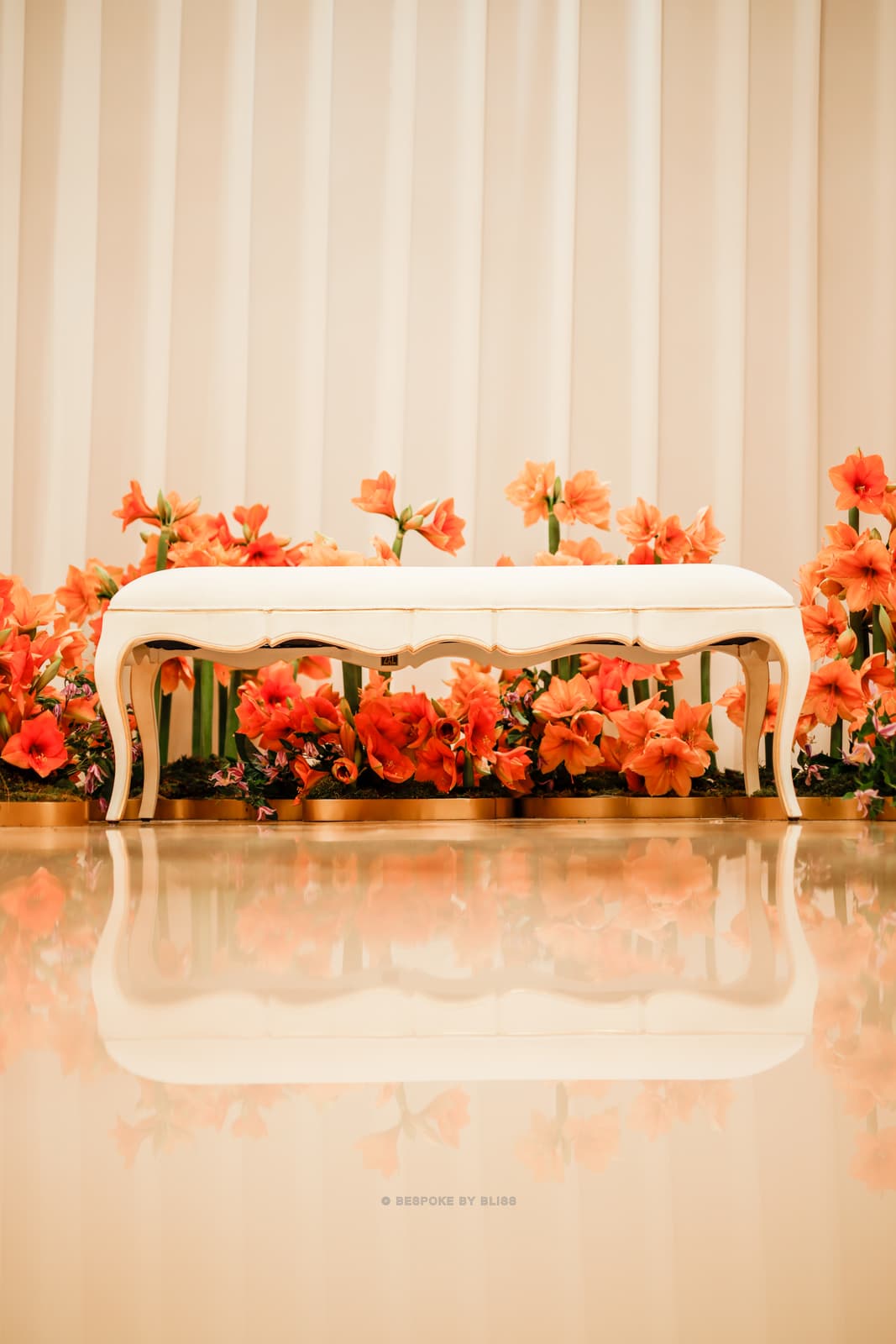 Stage styling in orange, ivory and cream
