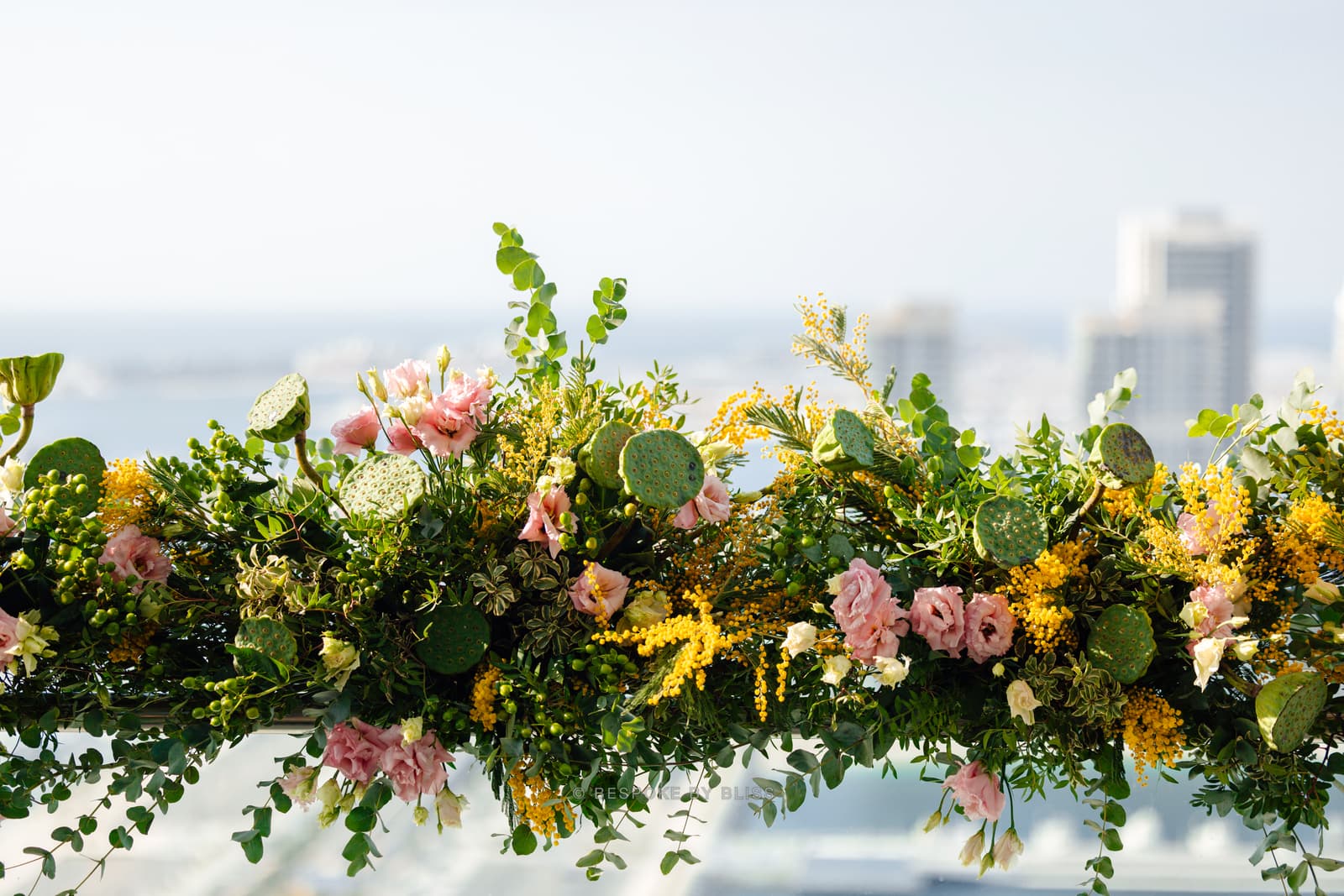 Floral wall or arch in green, pink and yellow