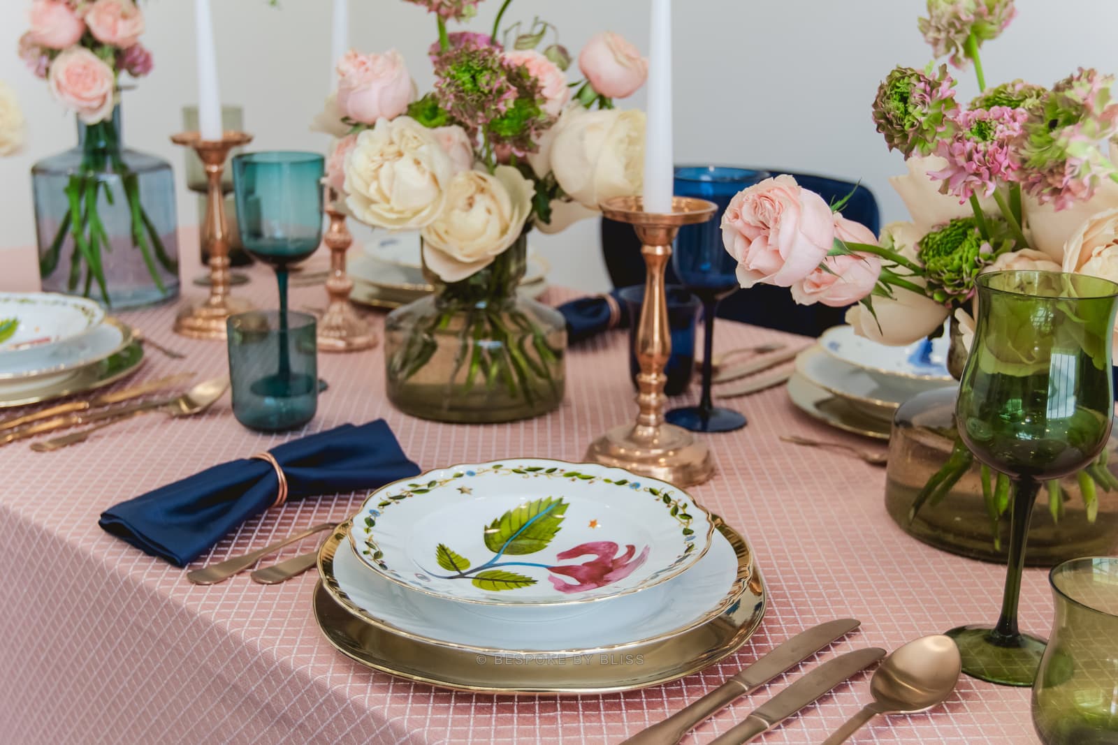 Table setting detail in pink, navy and green