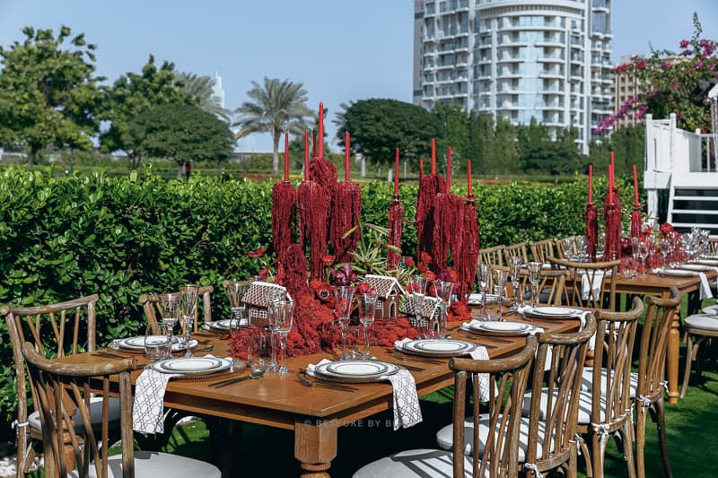 Full room view in red, wood and green