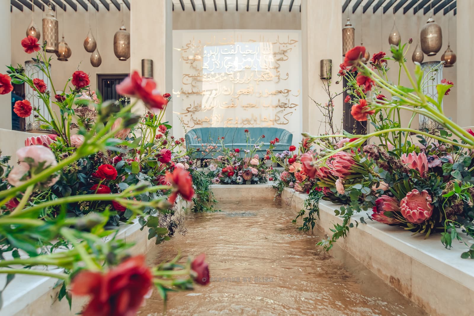 Entrance styling in red, pink and sand