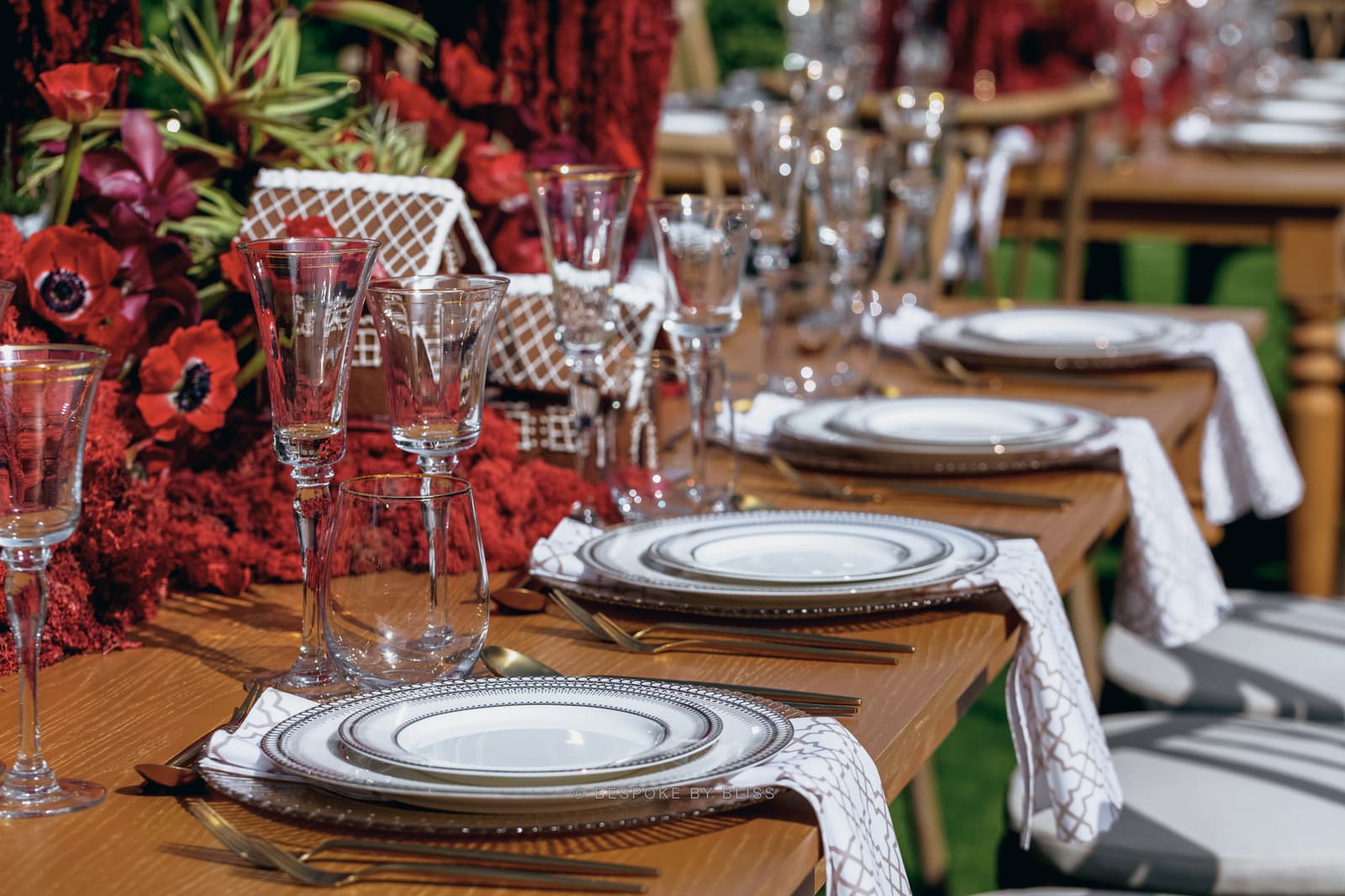Table setting detail in red, white and wood