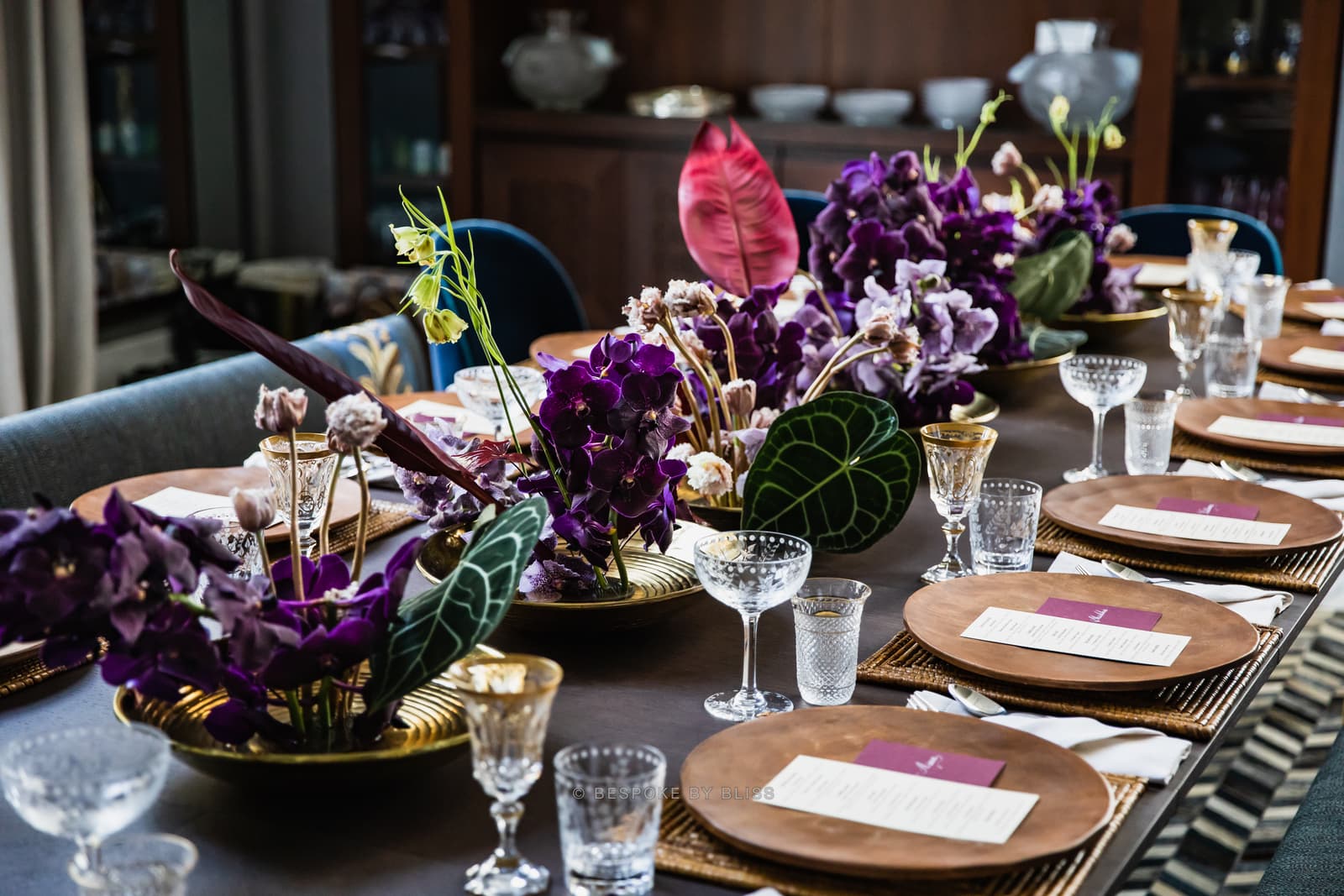 Table centrepiece in purple, copper and gold