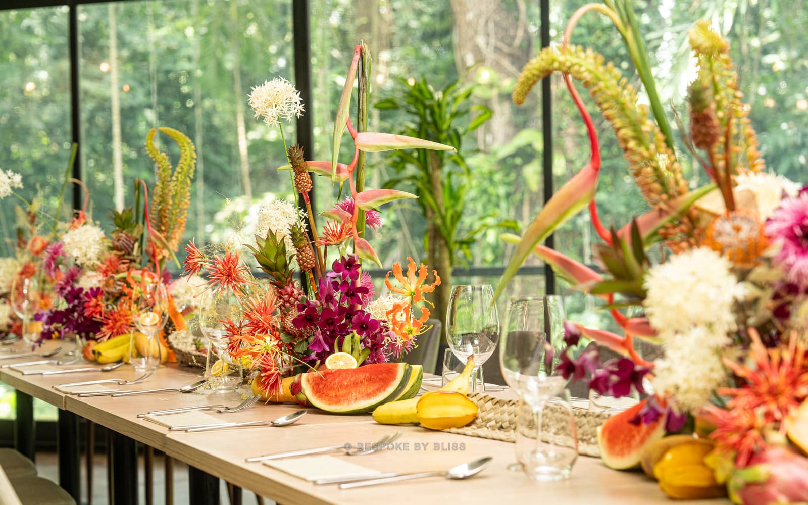 Table centrepiece in orange, magenta and yellow